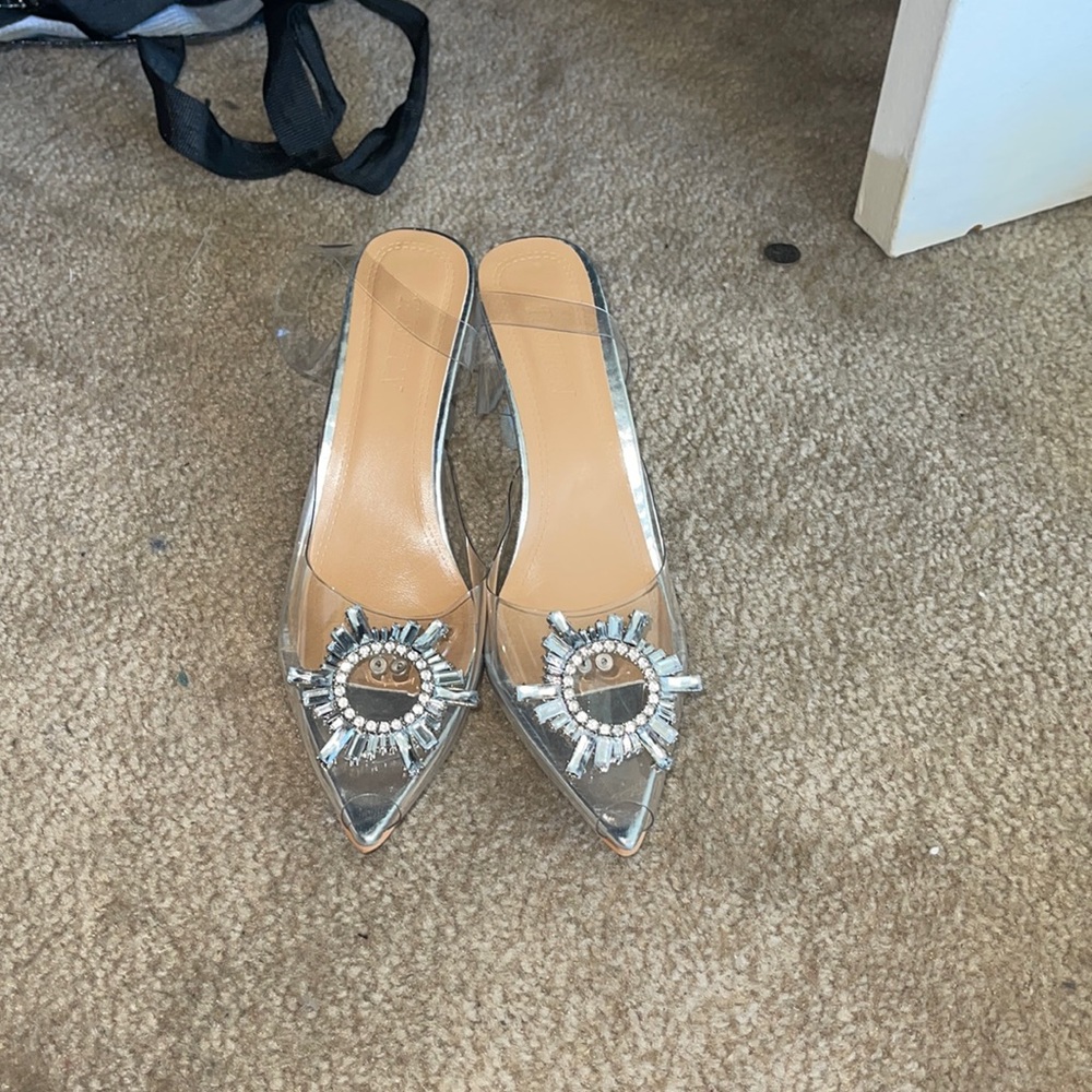 Clear and silver heels